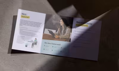 Tentoo brochure opengevouwen met pagina's 'What is Tentoo?' en 'What does Tentoo do?'